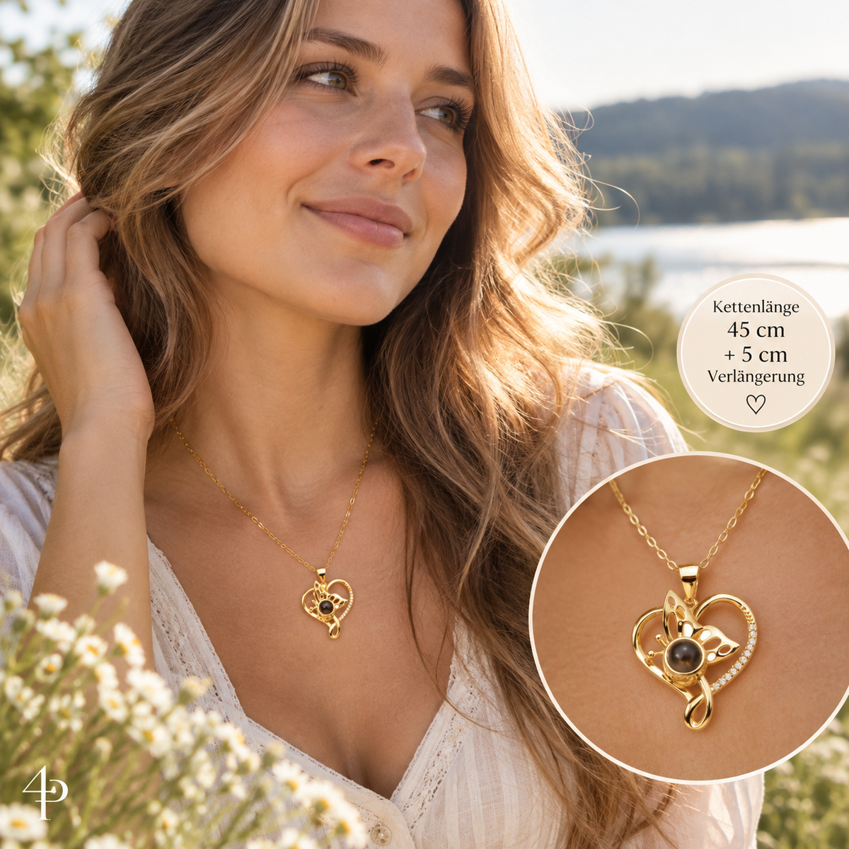 Frau trägt goldene Fotokette – Herz und Schmetterling von 4MyLove mit Projektionslinse in der Natur