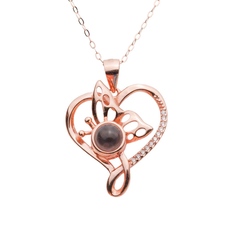 Roségoldene Fotokette – Herz und Schmetterling von 4MyLove mit Projektionslinse