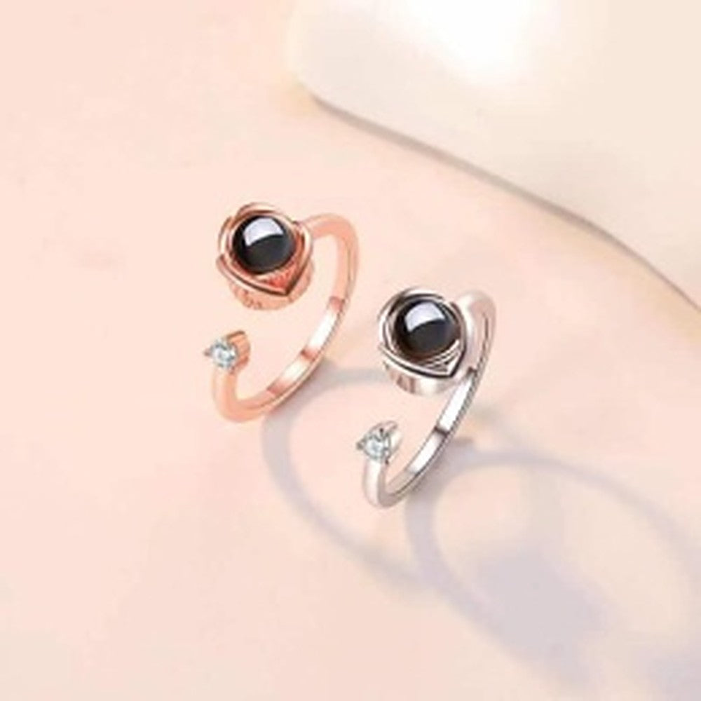 Offene Fotoringe mit schwarzer Linse und kleinen Kristallen in Roségold und Silber