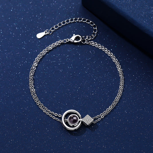 Personalisiertes Fotoarmband mit Kristallraute und eigenem Bild